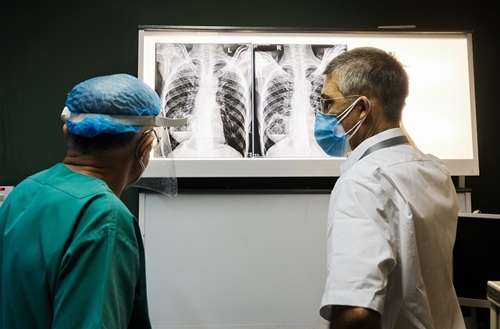 Doctors looking at X-ray